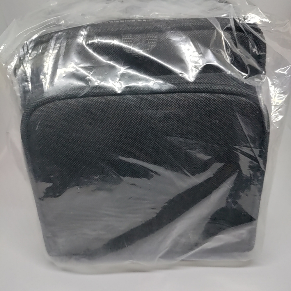Black Hi-Gear Camera bag with strap. New can fit a DSLR with regular Lens.